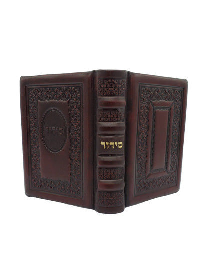 Cover and spine of the pocket Sefard siddur, maroon antique leather