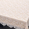 Leaf Lace Tablecloth — white leaf-patterned lace tablecloth on a set table linens | Judaica Square Lakewood