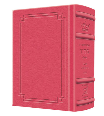 A pocket Ashkenaz Shabbos and Yom Tov siddur bound in fuchsia pink Signature Leather, 1,200 pages
