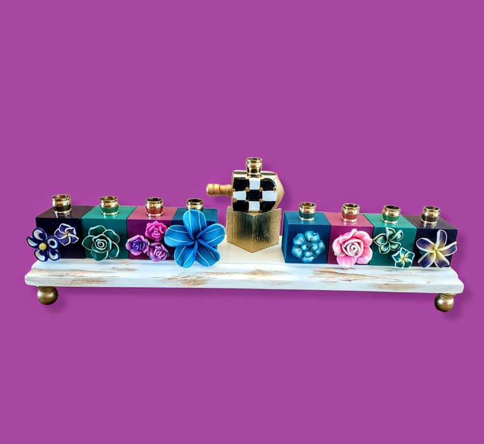 Checkerboard tropical menorah — hand-painted flowers on white and gold checked base | Judaica Square Lakewood