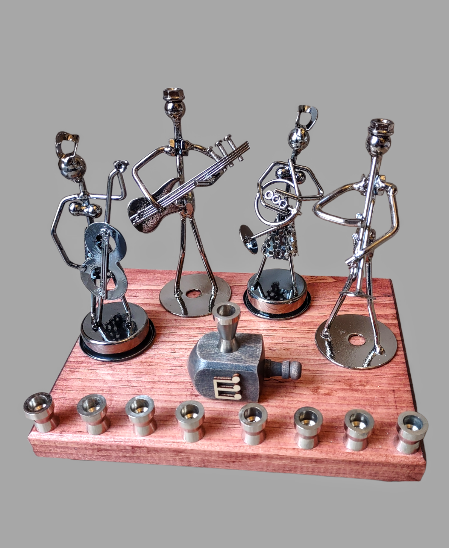 Iron Art Quartet Menorah — twisted metal musician figures on stained wood | Judaica Square Lakewood (view 3)