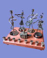 Iron Art Quartet Menorah — twisted metal musician figures on stained wood | Judaica Square Lakewood