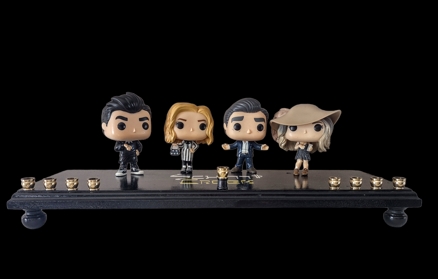Schitt's Creek Menorah — Rose family collector figures along a 24-inch wood plaque | Judaica Square Lakewood (view 2)