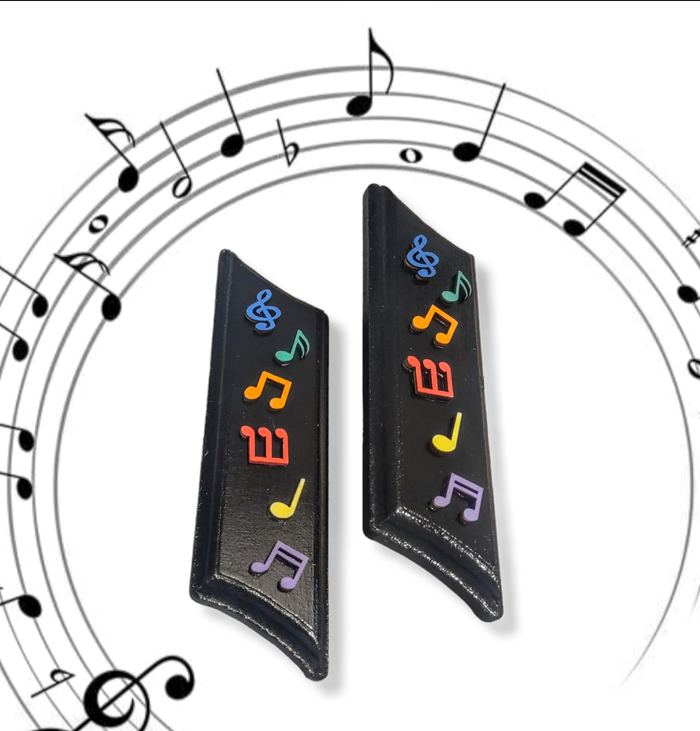 Music note mezuzah case — laser-cut painted wood notes raised on the case | Judaica Square Lakewood