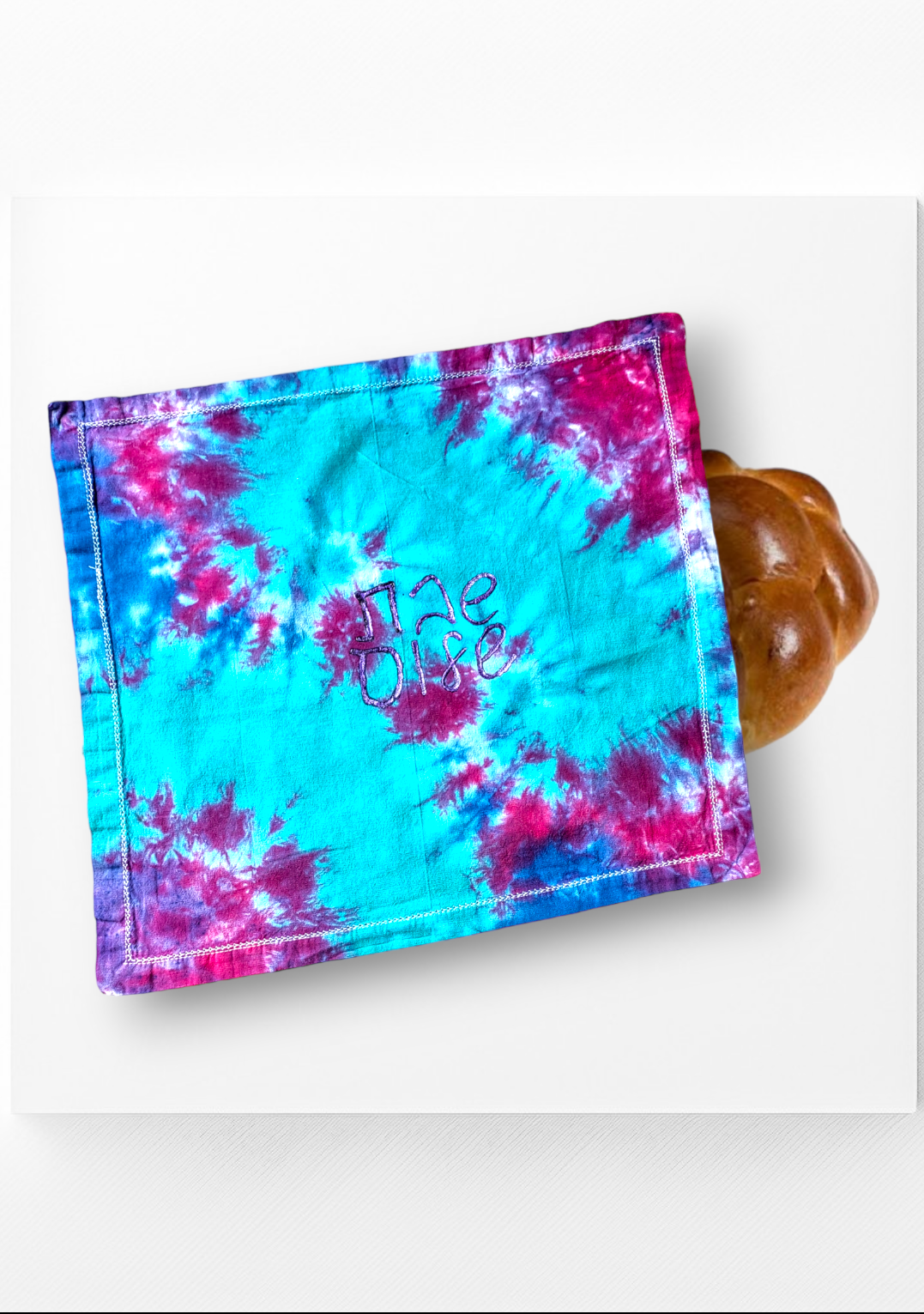 Tie-dyed challah cover — 18-inch cotton square in swirled dye with Hebrew Shabbat Shalom | Judaica Square Lakewood (view 2)