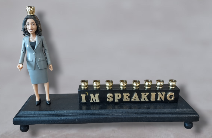 I'm Speaking Menorah — Kamala Harris figure with wood letters and brass cups | Judaica Square Lakewood