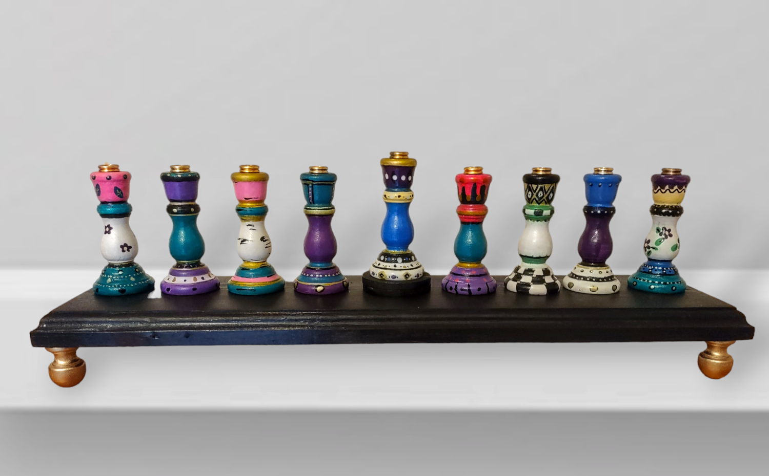 Colorful candlestick menorah — each tapered holder painted in a different pattern | Judaica Square Lakewood (view 4)