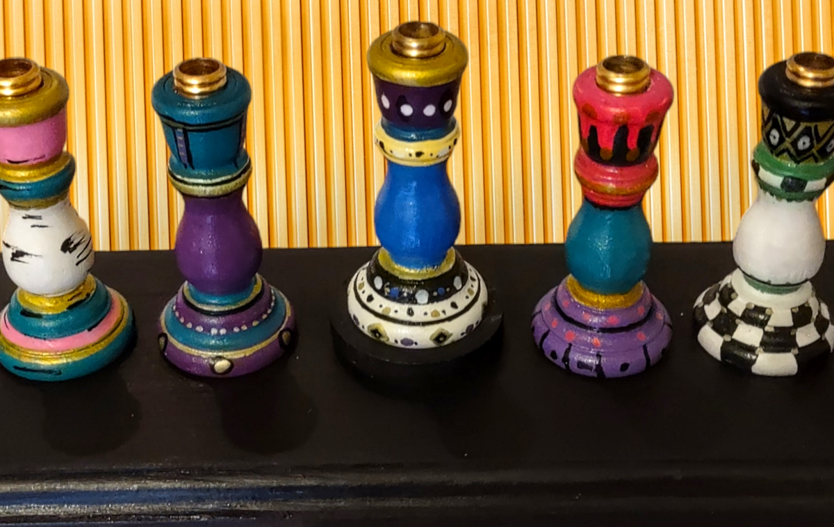 Colorful candlestick menorah — each tapered holder painted in a different pattern | Judaica Square Lakewood (view 5)