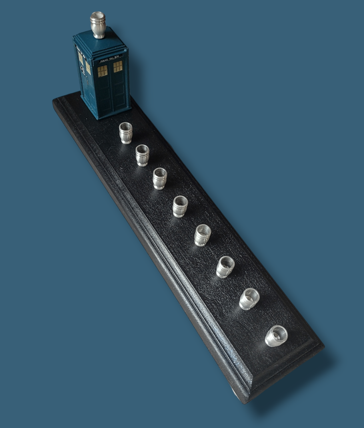 TARDIS menorah — Doctor Who time machine figure with painted wood feet | Judaica Square Lakewood (view 3)