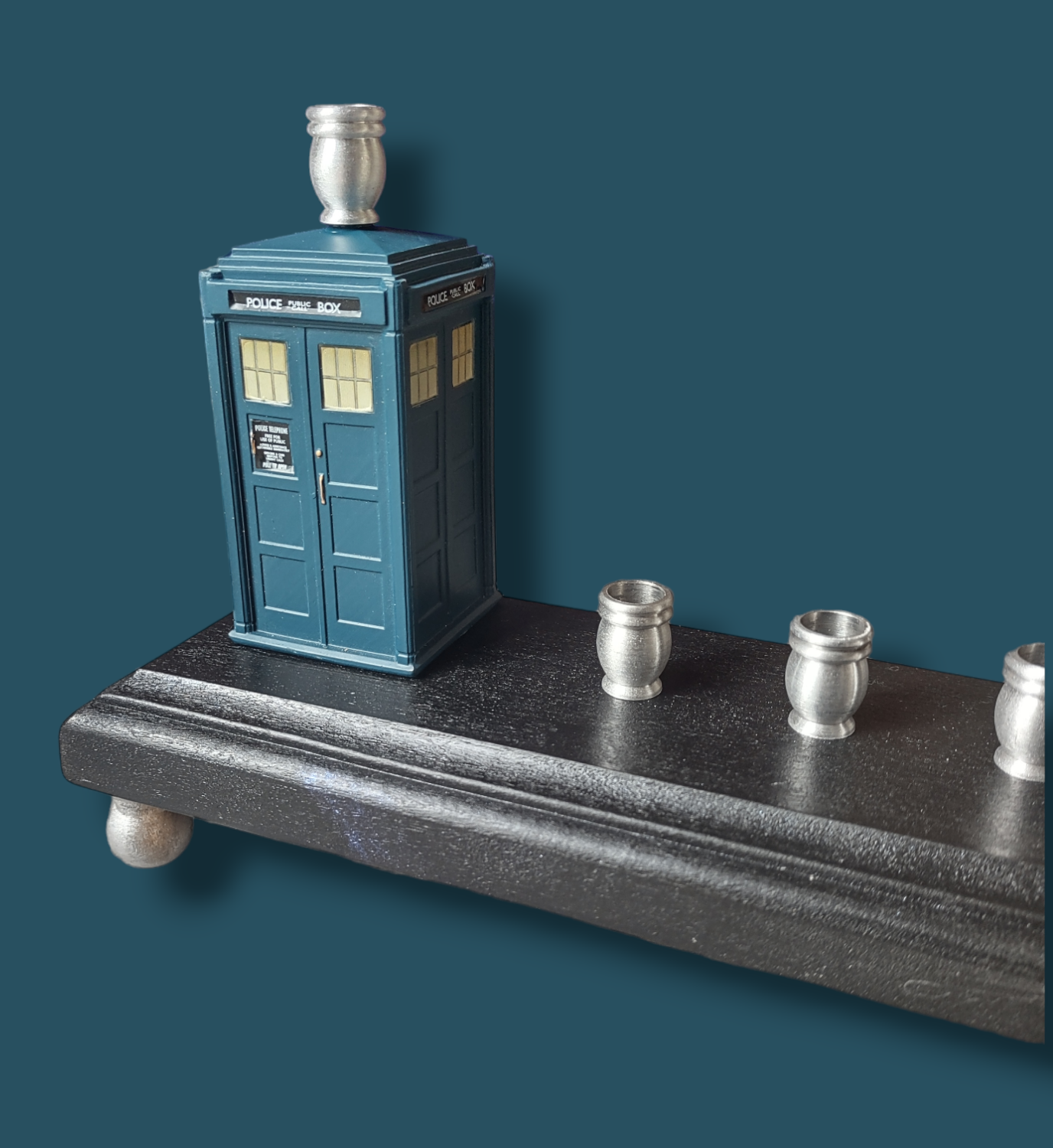 TARDIS menorah — Doctor Who time machine figure with painted wood feet | Judaica Square Lakewood (view 4)