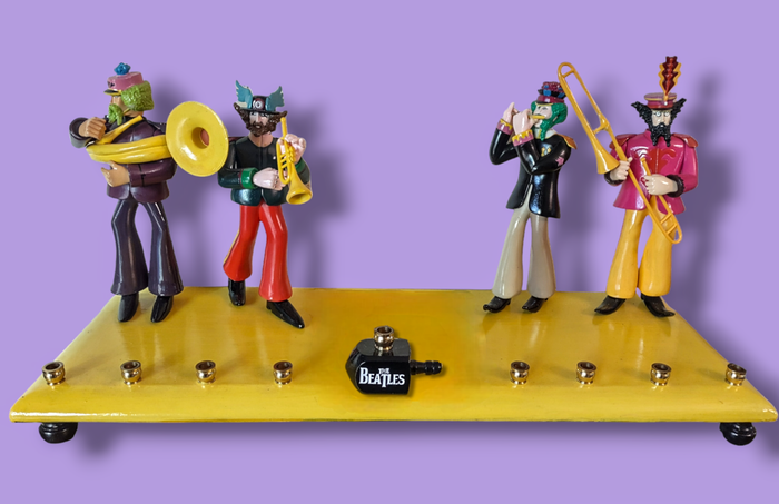 Beatles menorah — vintage Sgt. Pepper band figures on hand-painted wood base | Judaica Square Lakewood
