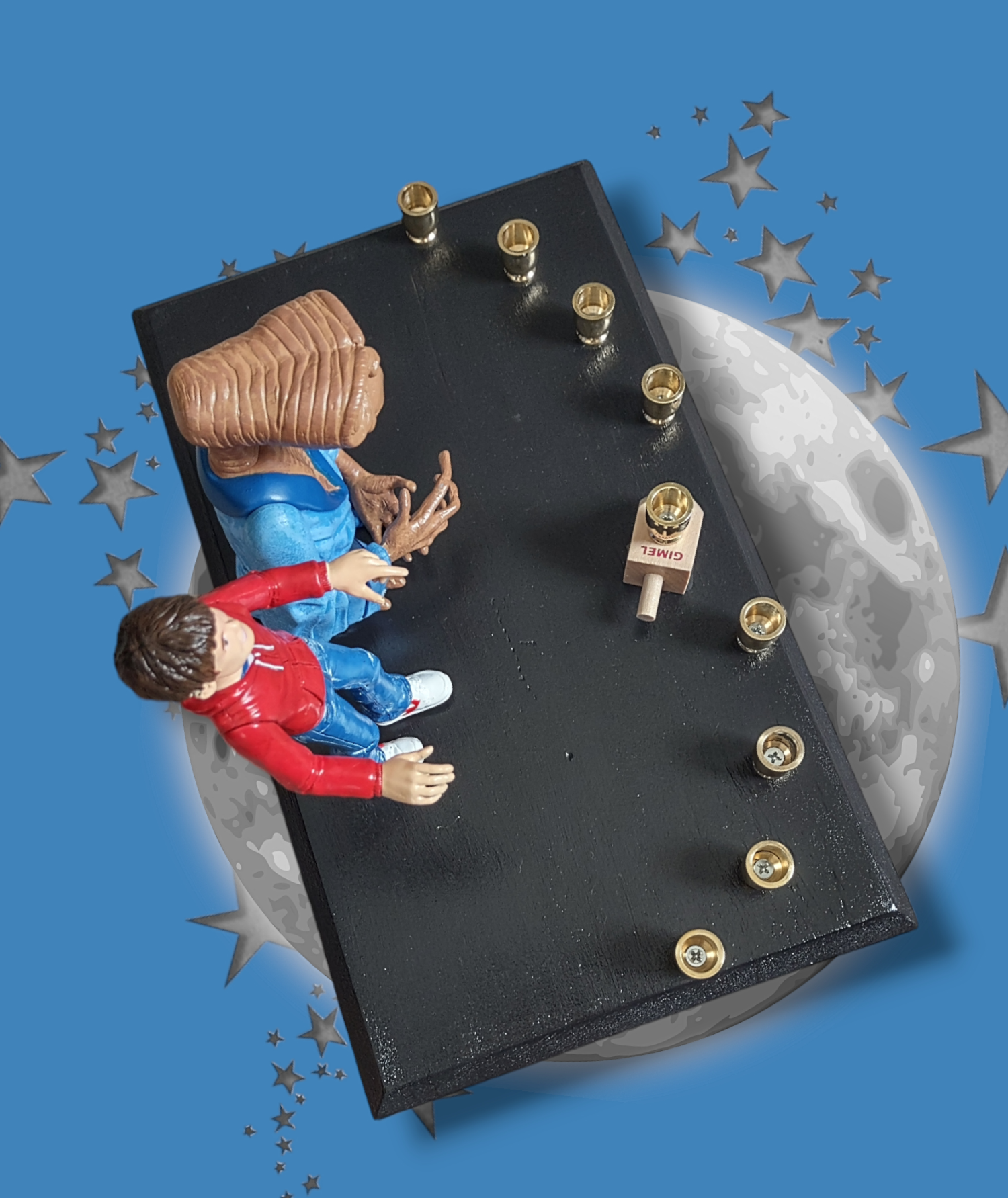 E.T. and Elliott menorah — pair of repurposed 80s toy figures with brass cups | Judaica Square Lakewood (view 4)