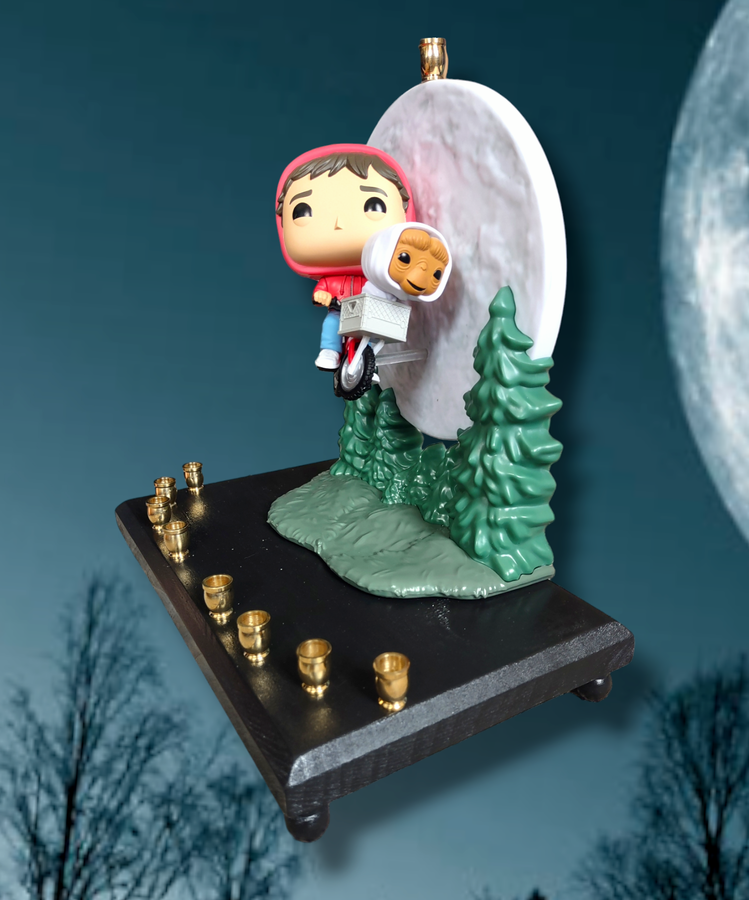 E.T. bike over the moon menorah — collectible flight scene above the treeline | Judaica Square Lakewood (view 3)