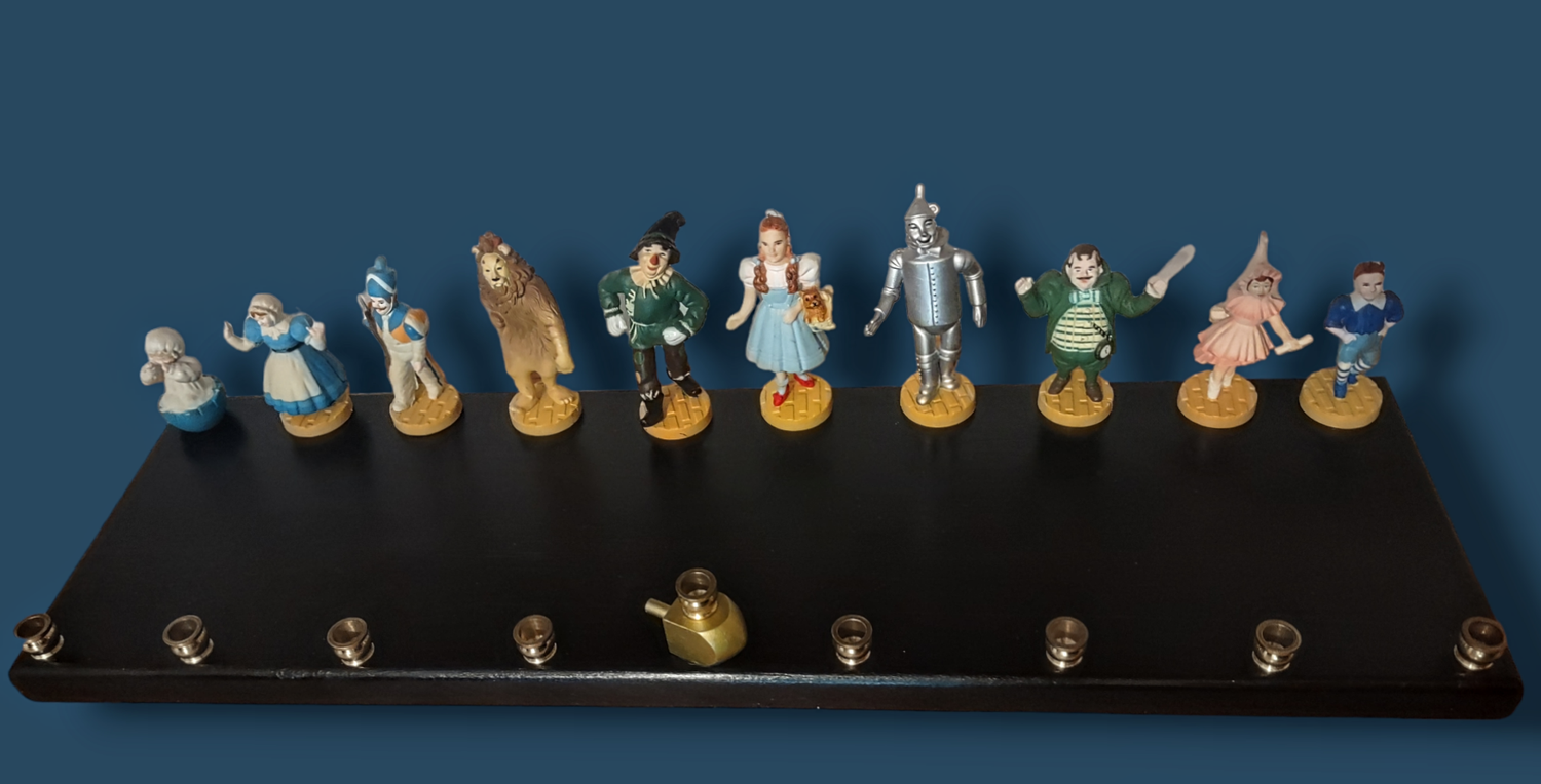 Large Wizard of Oz menorah — 20-inch wood plaque lined with repurposed Oz figures | Judaica Square Lakewood (view 2)
