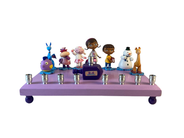 Doc McStuffins hospital menorah — licensed Disney figures, dreidel and aluminum cups | Judaica Square Lakewood
