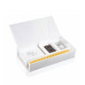 The white marble lucite Havdalah box open, showing the besamim compartment, napkins and candle