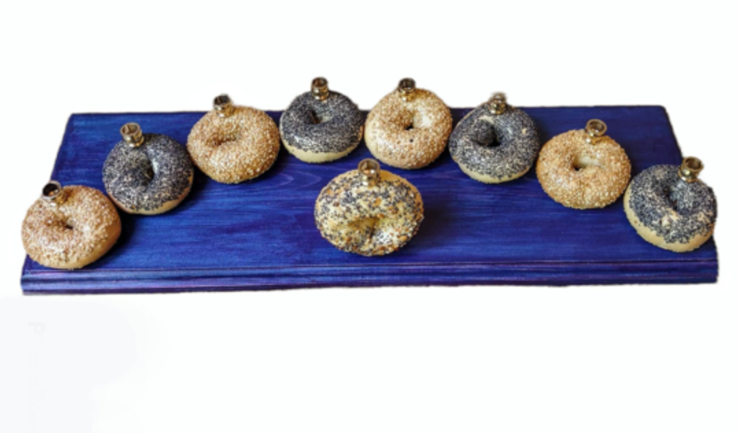 Bagel Lover's Menorah — nine real shellacked bagels on a long stained wood base | Judaica Square Lakewood (view 9)