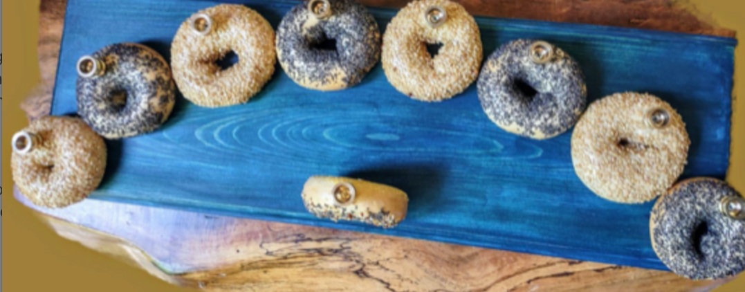 Bagel Lover's Menorah — nine real shellacked bagels on a long stained wood base | Judaica Square Lakewood (view 10)