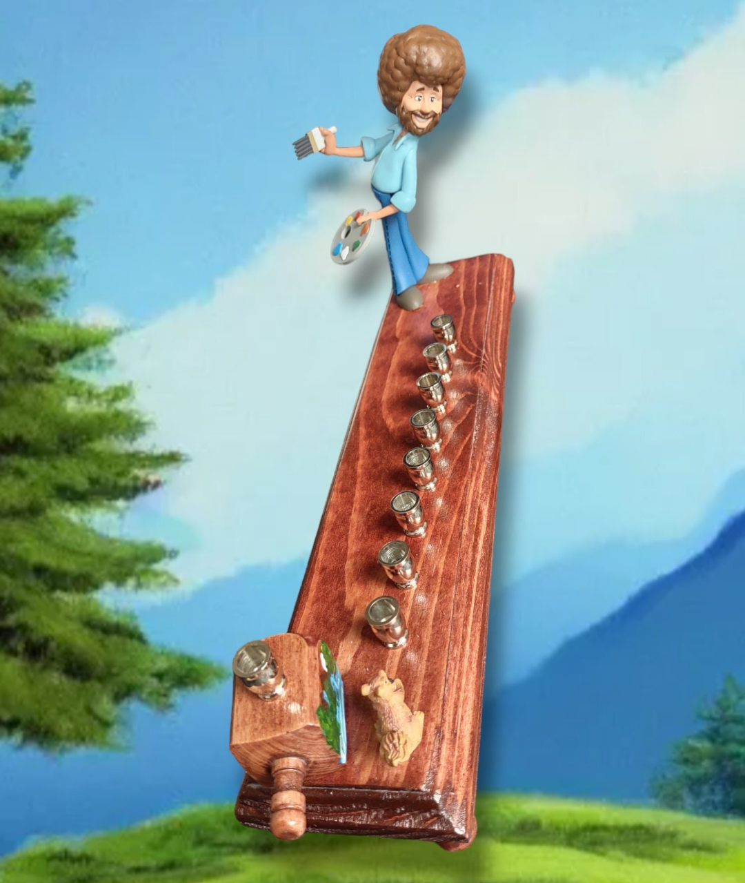 Bob Ross menorah — painter figure with wooden squirrel and nickel candle cups | Judaica Square Lakewood (view 2)