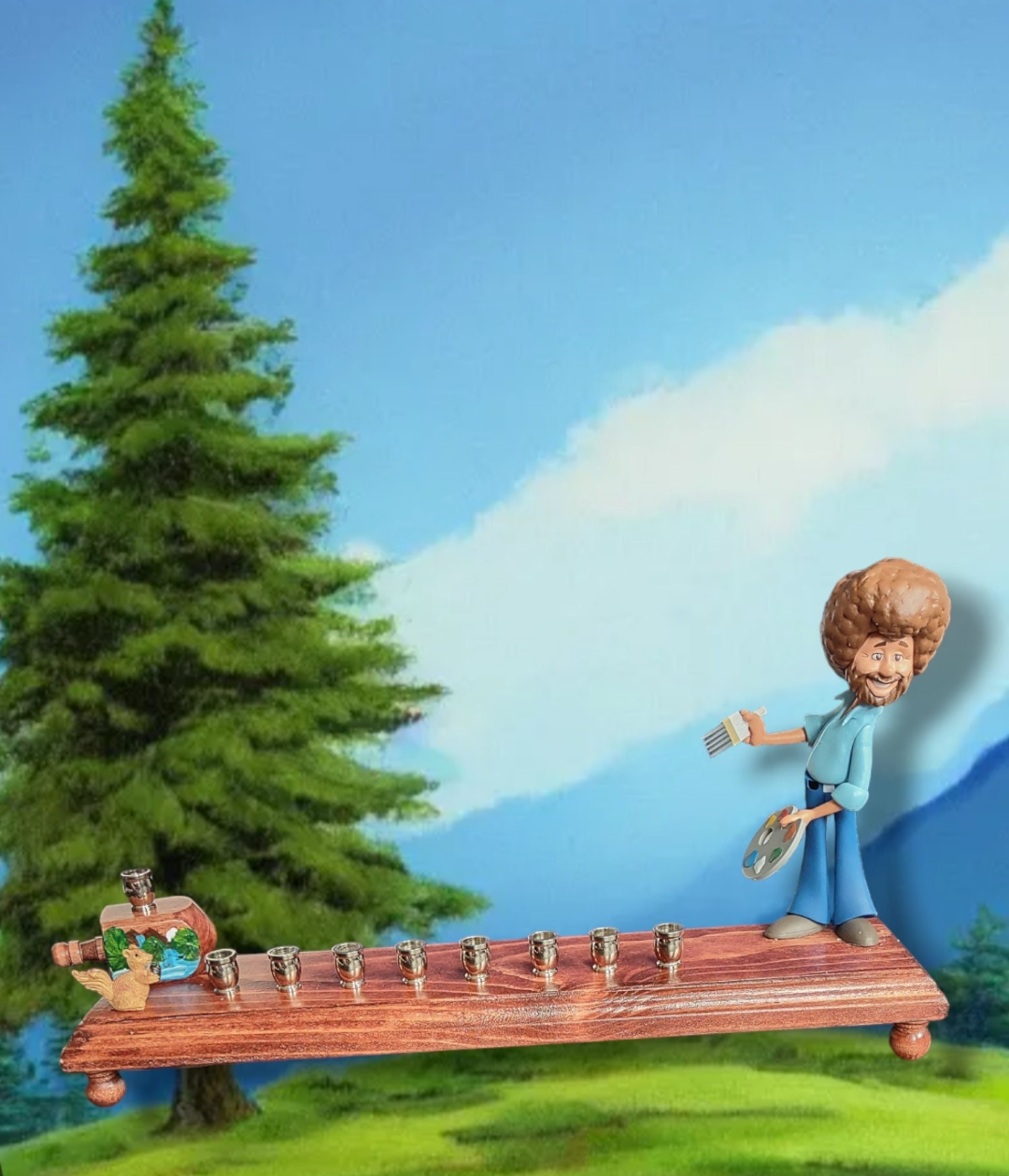 Bob Ross menorah — painter figure with wooden squirrel and nickel candle cups | Judaica Square Lakewood (view 3)