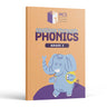 Spelling Through Phonics Grade 2 front cover — waving blue cartoon elephant on an orange grid background with the MCS logo