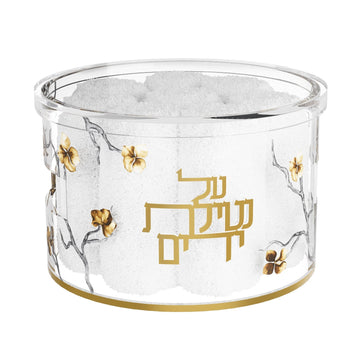 Golden Branch round clear towel box, Hebrew edition with gold Al Netilas Yadayim, filled with white towels