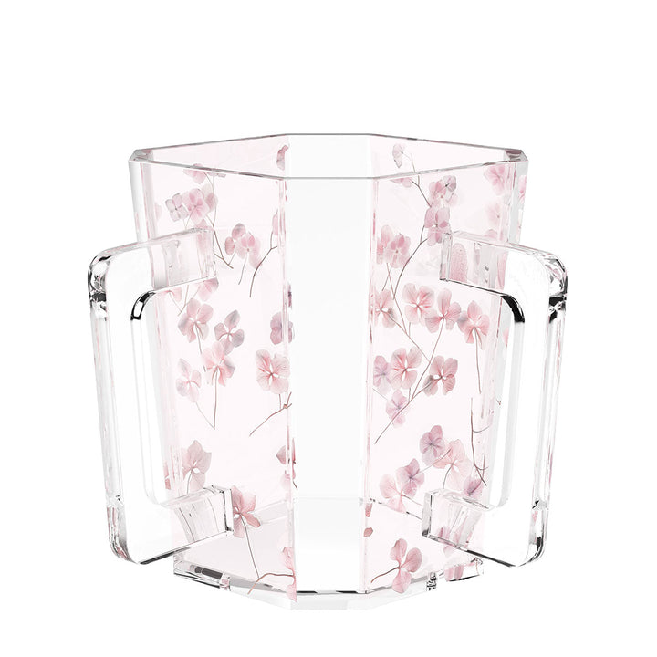 Clear acrylic two-handled washing cup with pink hydrangea petals in its walls