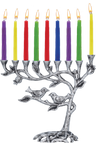 Antique silver Tree of Life menorah with branches holding colored Chanukah candles
