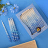 Handmade box of blue and white ombre spiral Chanukah candles
