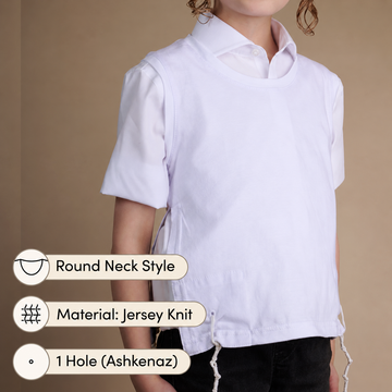 Boy wearing a white round-neck tzitzis undershirt with one-hole corners
