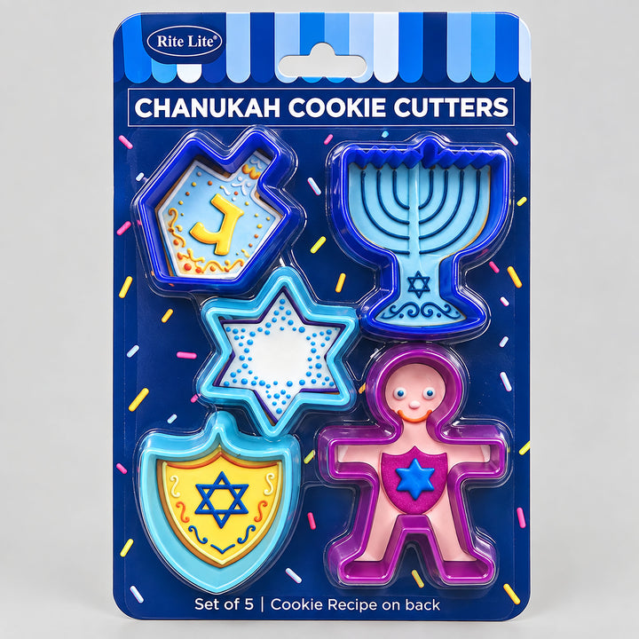 Five plastic Chanukah cookie cutters in dreidel, menorah, star, Maccabee and shield shapes on a Rite Lite card