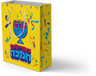 Yellow Chanukah gift bag with a blue menorah and Yiddish lettering