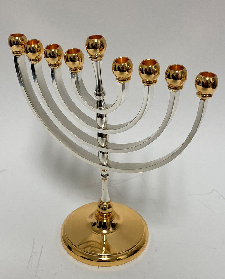 Classic menorah with silver plated curved arms, gold plated round cups and a gold plated base