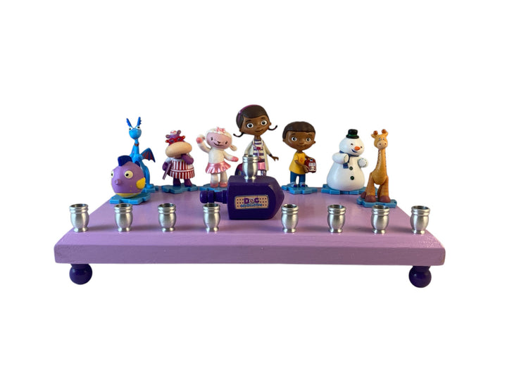 Doc McStuffins menorah on a lavender base