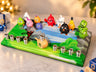 Angry Birds figures on a green hand-painted base