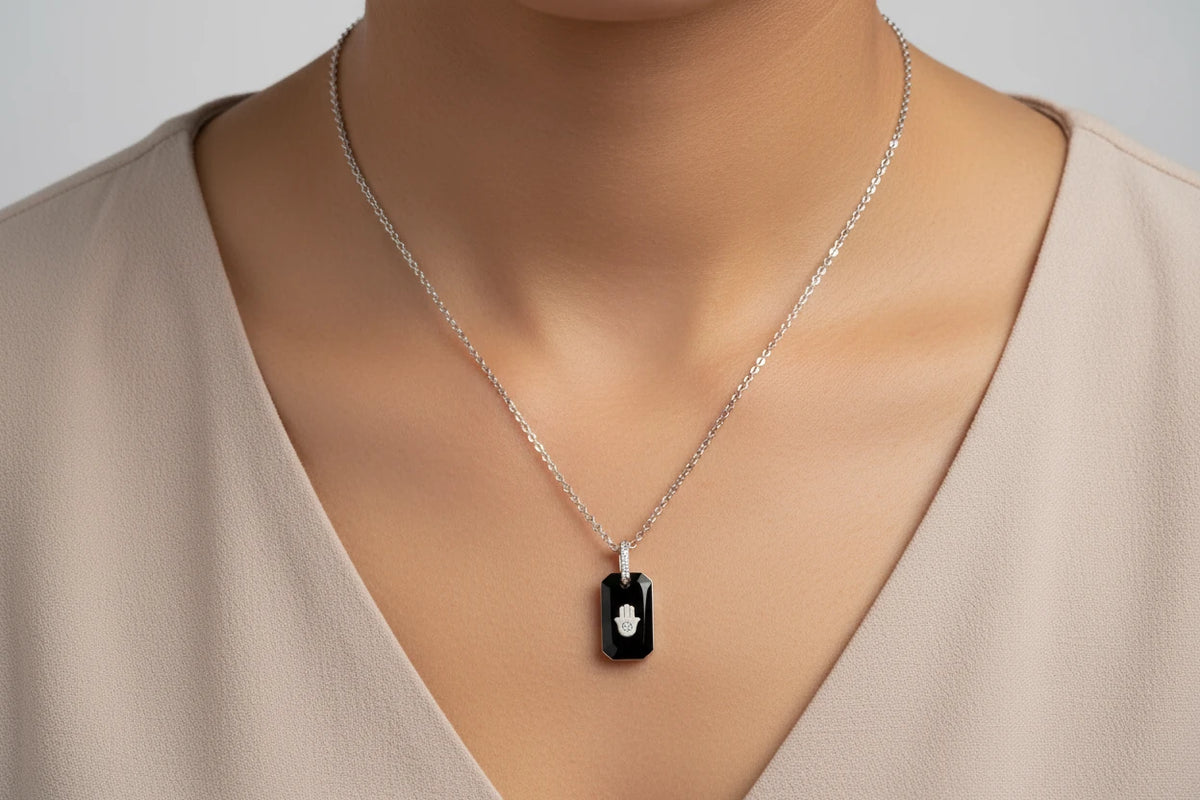 Black Onyx and CZ hamsa pendant sterling silver necklace, onyx hamsa necklace worn at the neckline
