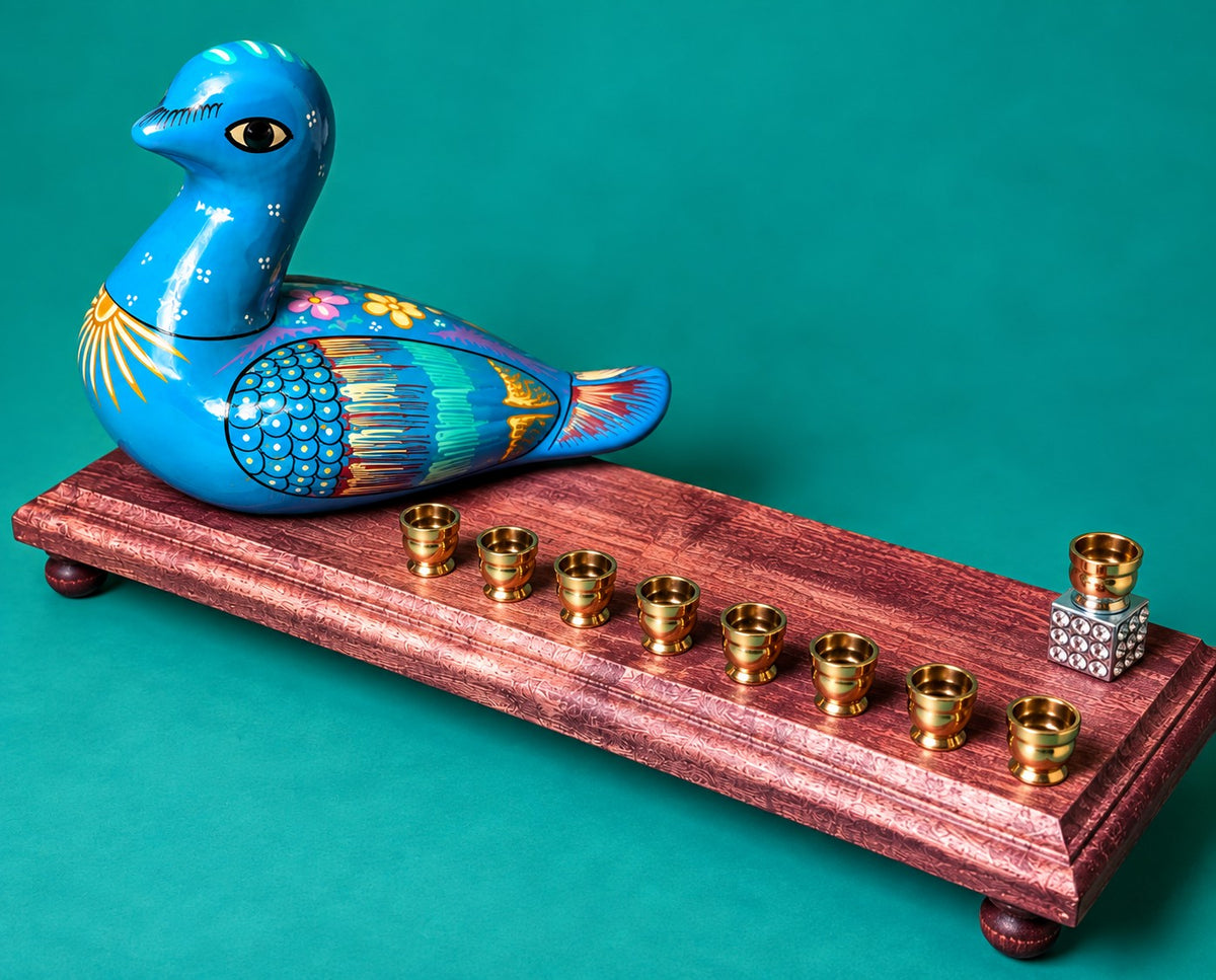 Blue bird menorah, angled view