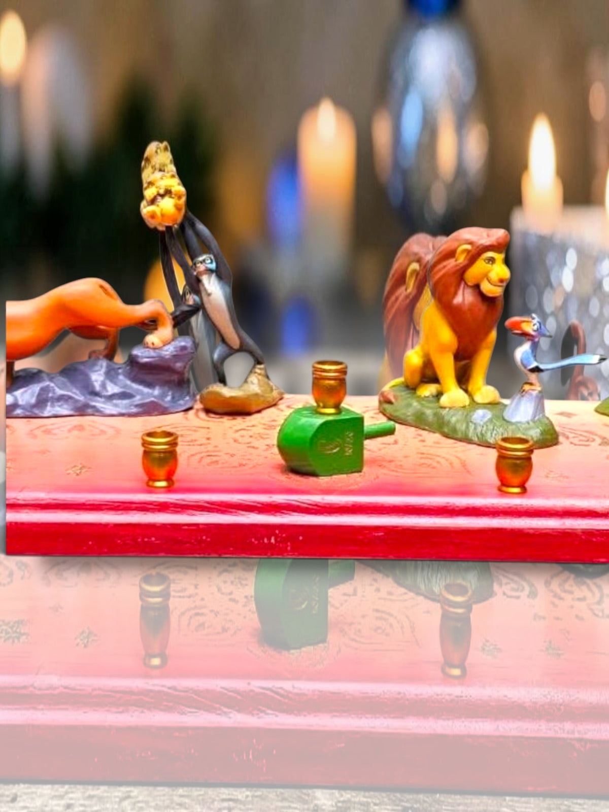 Collector’s Edition Lion King “Circle of Life” Menorah, close-up of the Lion King figures on the menorah base