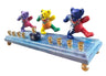 Dancing bears on a pale blue painted base (Playing in the Band)