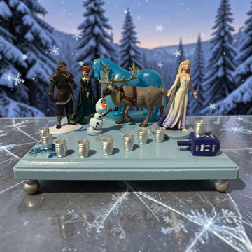 Frozen Menorah, Anna and Elsa figures with glitter dreidel shamash