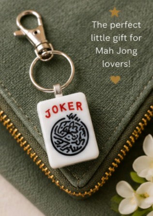Genuine Mah Jong Tile Keychain, Joker tile keychain on a green bag