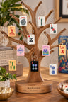 Mah Jong tile ornaments hanging on a tree stand