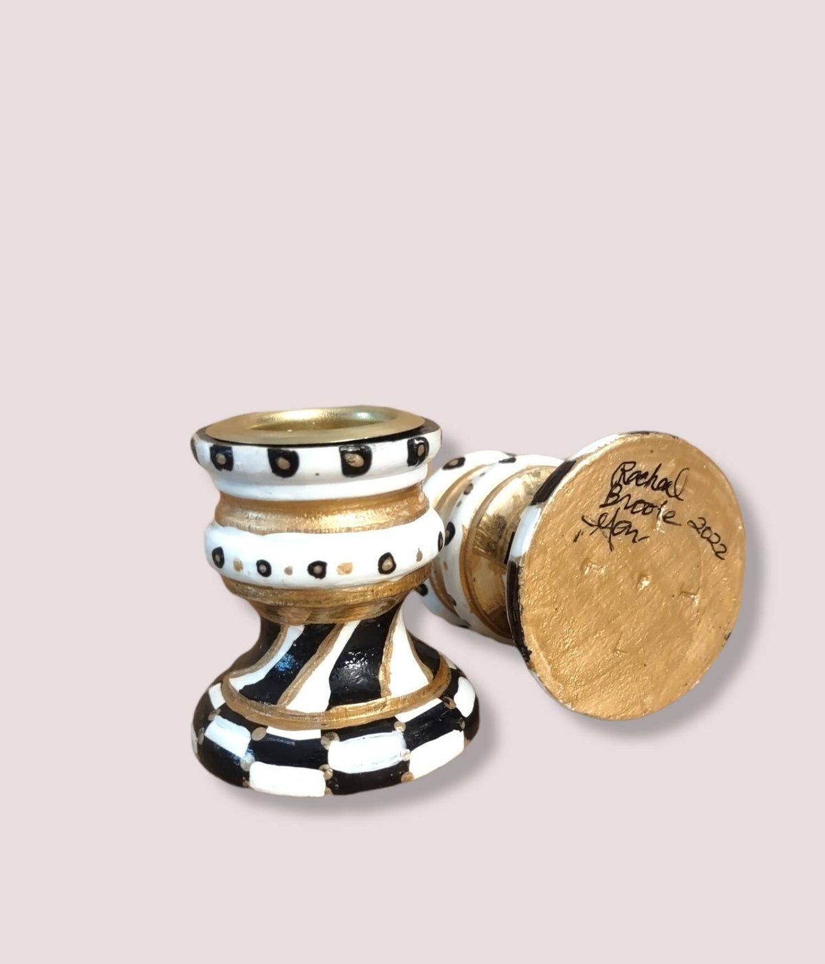 Golda Hand-Painted Shabbat Candlesticks, candlestick base showing the signed underside