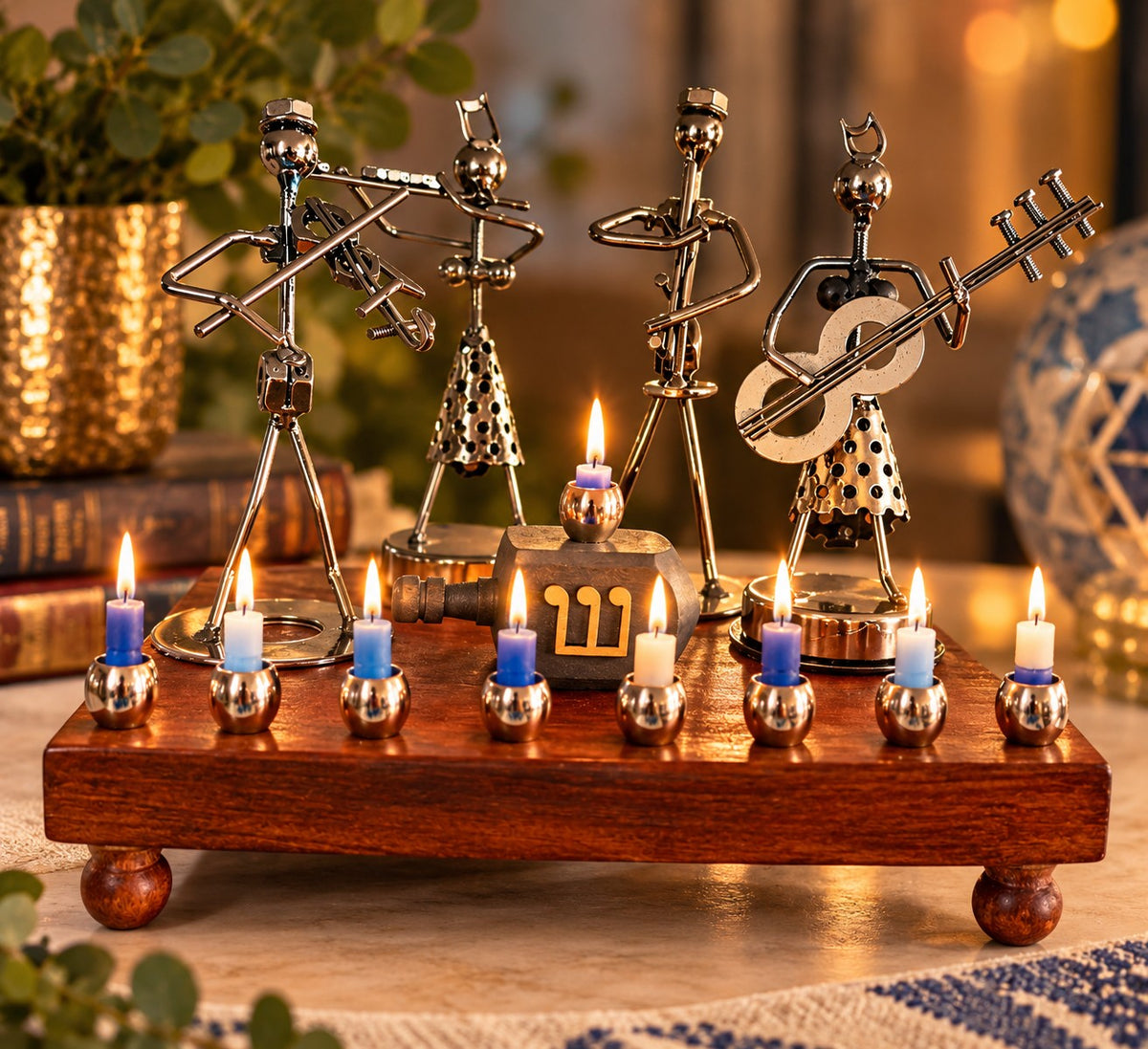 Hanukkah Quartet Menorah, musician menorah with candles lit on a table