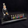 RBG figure with gavel and colourful I Dissent blocks (Rainbow)