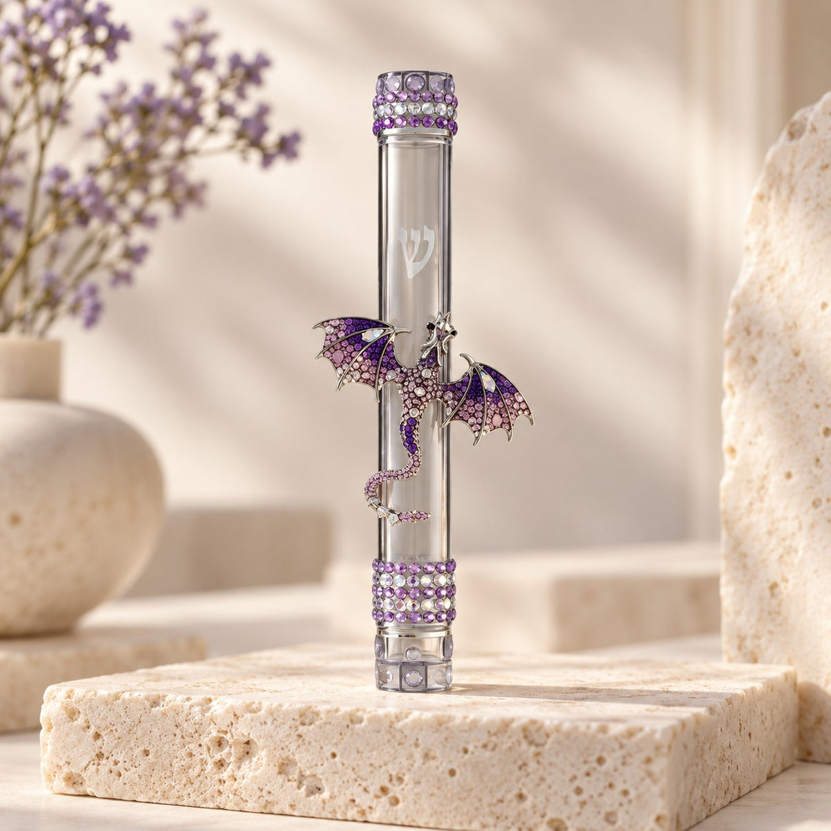 Purple jeweled dragon mezuzah case on stone