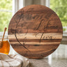 Round wood board engraved with L'shana Tova and apple