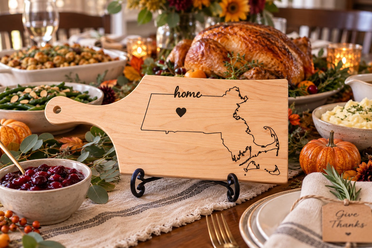 Massachusetts Home Engraved Maple Cutting Board, Massachusetts home board on a stand at a holiday table