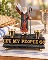 Moses Let My People Go Shabbat Candle Holders, Moses figure with staff on a black base with two candle holders