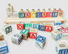Name block menorah with loose alphabet blocks